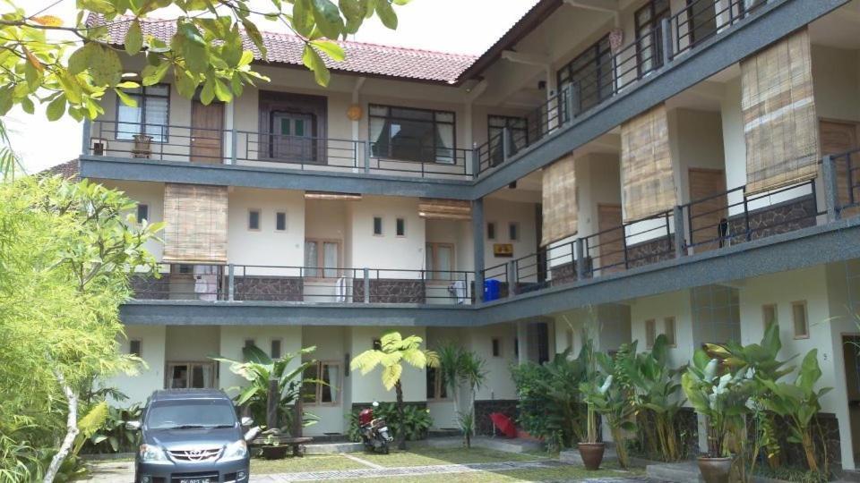 Urbanview Hotel Wayan Mansion 丹帕沙 外观 照片