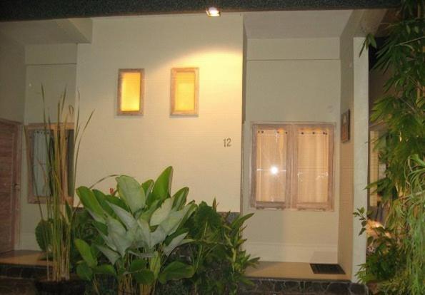 Urbanview Hotel Wayan Mansion 丹帕沙 外观 照片