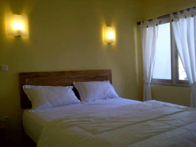 Urbanview Hotel Wayan Mansion 丹帕沙 外观 照片