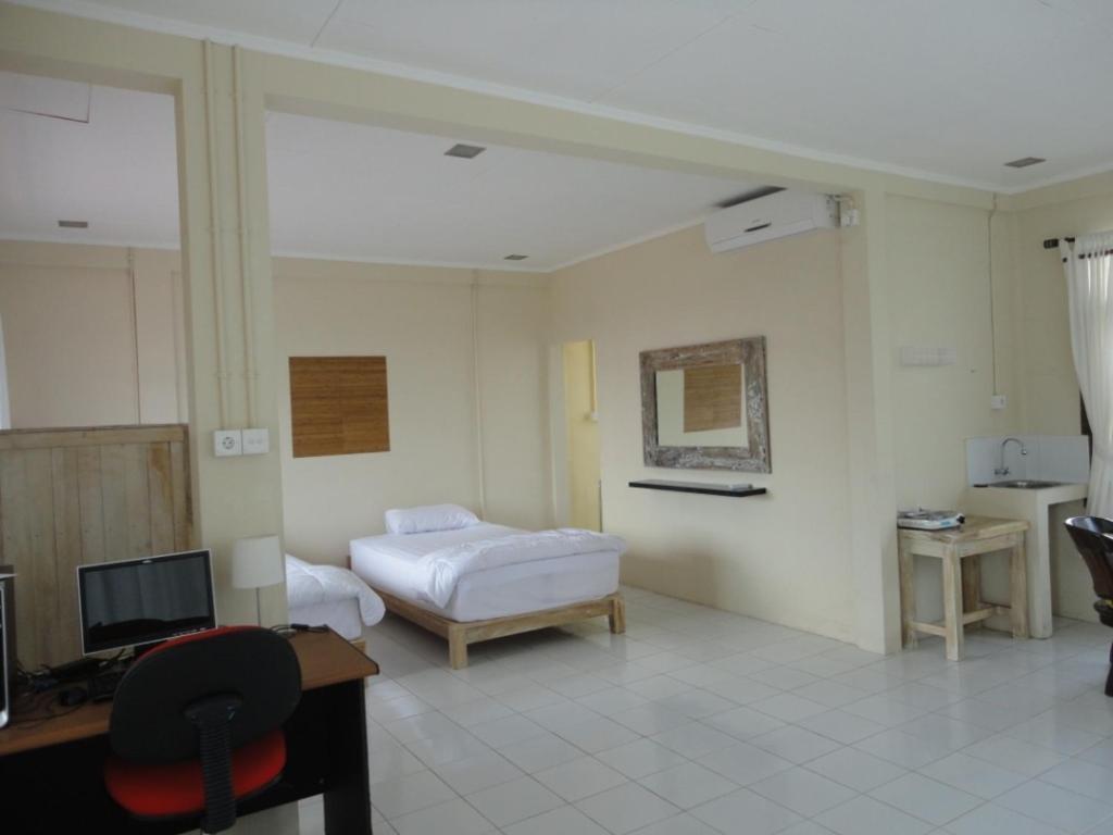 Urbanview Hotel Wayan Mansion 丹帕沙 客房 照片