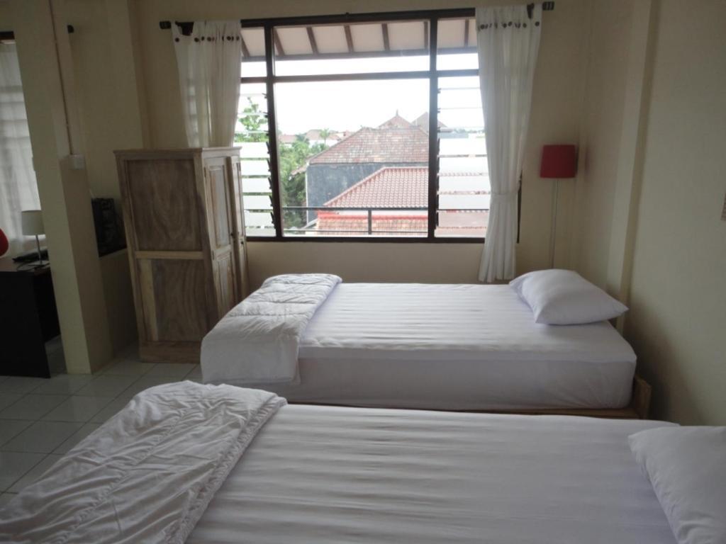 Urbanview Hotel Wayan Mansion 丹帕沙 客房 照片