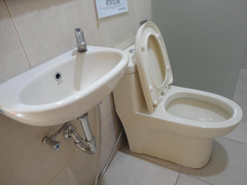 Urbanview Hotel Wayan Mansion 丹帕沙 外观 照片
